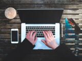 flat-lay photography of person about to use laptop computer