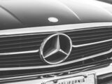 grayscale photo of Mercedes-Benz