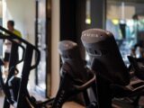 a row of treads in a gym with people in the background