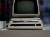 A vintage commodore computer sits on display.