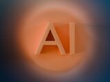 The letters ai glow with orange light.