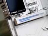 Close-up of a white computer motherboard with "crosshair" text.