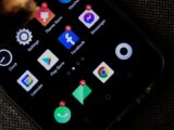 Close-up of a smartphone screen displaying various social media and app icons.