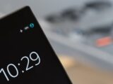 Focused image of a smartphone showing a 10:29 time with blurred background.
