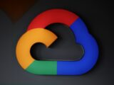 The logo for google is shown on a wall