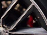 Modern car wheel rim with a visible tire valve.