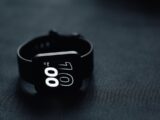 a close up of a watch on a table