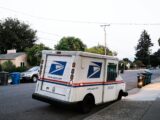 white and blue van on road during daytime