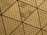 a close up of a ceiling with a pattern on it