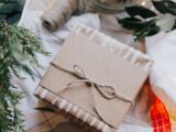 brown gift box on white and red checkered textile