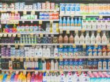 assorted drinks on white commercial refrigerator