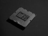A close up of a processor chip on a table