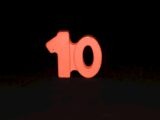 The number ten is lit up in the dark