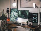 black flat screen computer monitor on white wooden desk