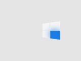 A white and blue four-pane window icon on a light grey background
