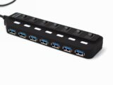 Black usb hub with seven ports and switches