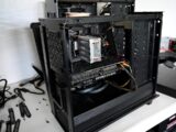 black computer tower on white table