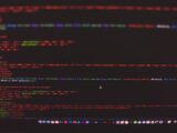 Close-up view of colorful CSS and HTML code displayed on a dark computer screen.